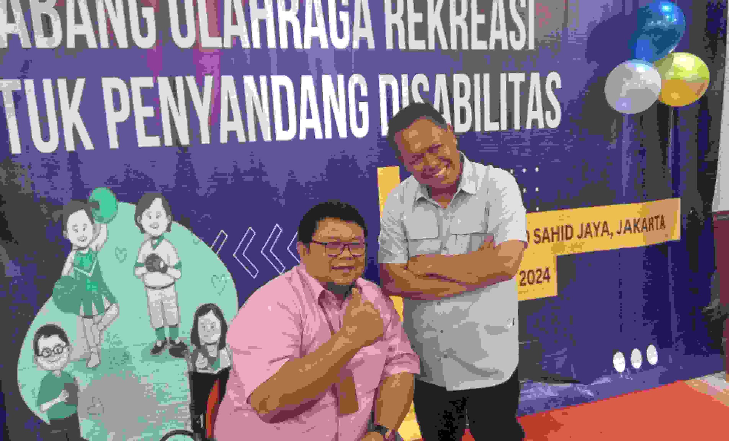 Ketua Umum DPP PPDI Norman Yulia (Kiri) Bersama Asisten Deputi Olahraga Disabilitas Kemenpora Ibnu Hasan (Kanan)